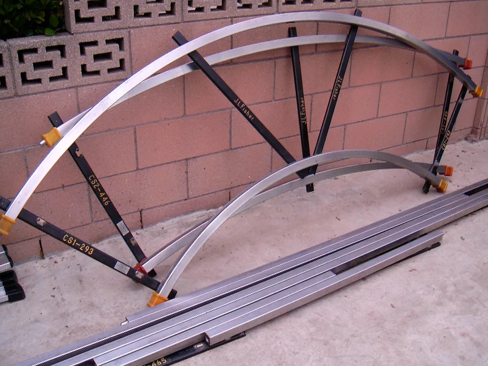 Straight and curved camera dolly tracks showing different possible physical camera paths